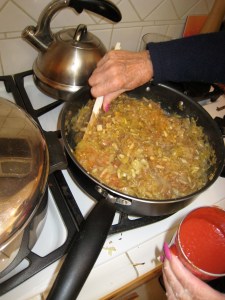 add tomato sauce, chicken seasoning, sugar and pepper flakes
